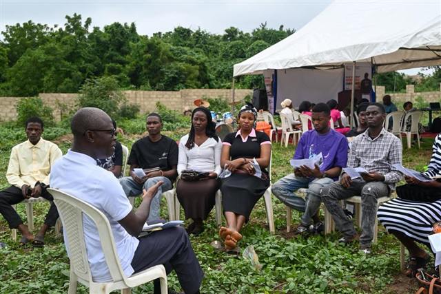 Small group Bible study held outdoors