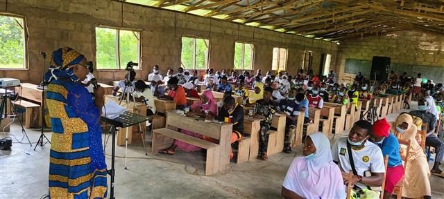 Participants seated in a hall for a health seminar